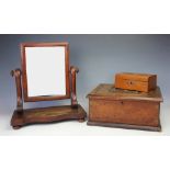 A 19th century mahogany cushion frame dressing table swivel mirror,