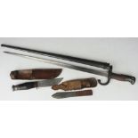 An 1877 pattern French bayonet, in scabbard, with a William Rogers knife,