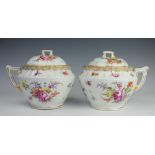 A pair of German porcelain lidded tureens,