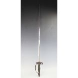 A 19th century cut steel dress sword, with 79cm etched blade, with six military cap badges on a cap,