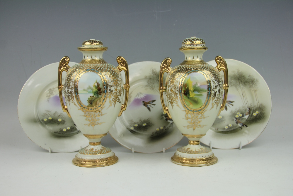 A pair of Japanese Noritake vases and covers,