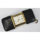 A Movado purse timepiece, the silvered dial with batons and subsidiary date dial,