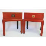 A pair of Chinese lacquered bedside tables, each with a single long drawer upon four block legs,