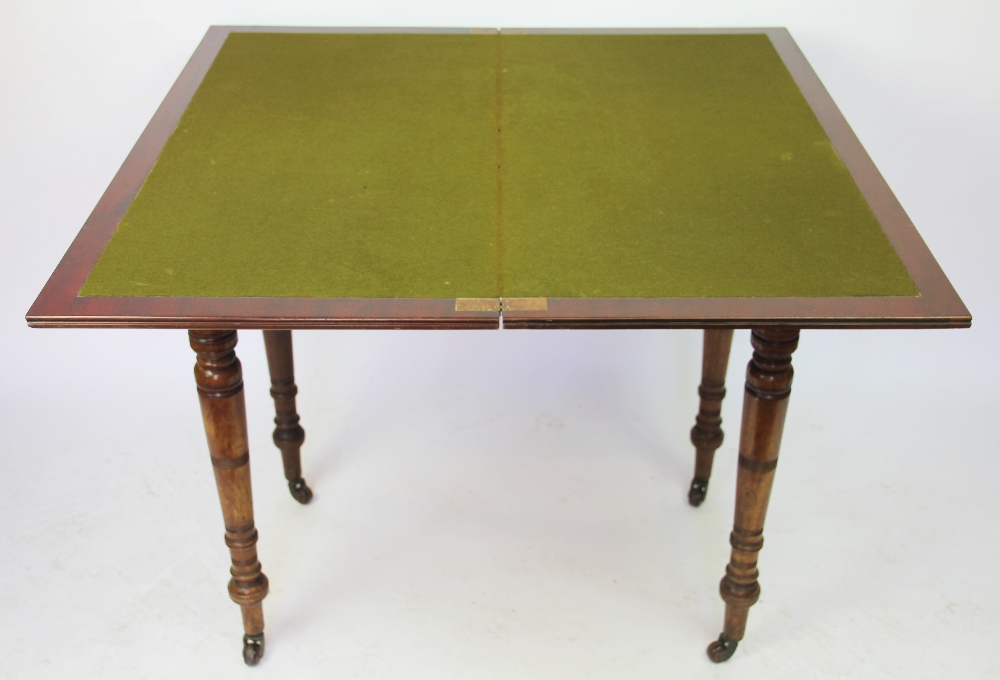 A late Victorian walnut card table, on turned and tapered legs, - Image 2 of 2