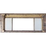 A Regency gilt wood and gesso over mantle mirror,
