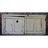 A Victorian painted pine estate kitchen cabinet, with two panelled doors above two cupboard doors,