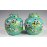 A pair of Chinese sancai glazed ginger jars and covers,