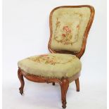 A Victorian walnut salon chair, with aubusson style upholstery,