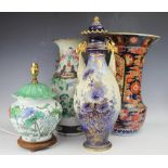 A late 19th century Chinese famille vert vase, decorated with figures in gardens (restored), 44cm,