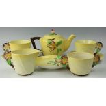 A Carltonware tea for two service, comprising teapot and cover, two cups and saucers, sugar bowl,