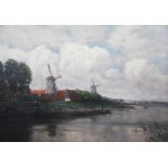 Clemens Freitag (1883-1969), Oil on canvas, Flemish river scene with windmills and fishing boats,