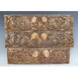 Two carved painted gilt and lacquered rectangular panels,