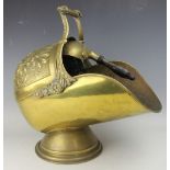 A Victorian brass coal scuttle and shovel,
