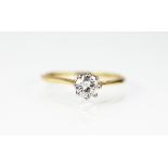 A diamond solitaire ring, the round brilliant cut diamond (of approx 0.