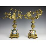 A pair of French gilt metal candelabrum,