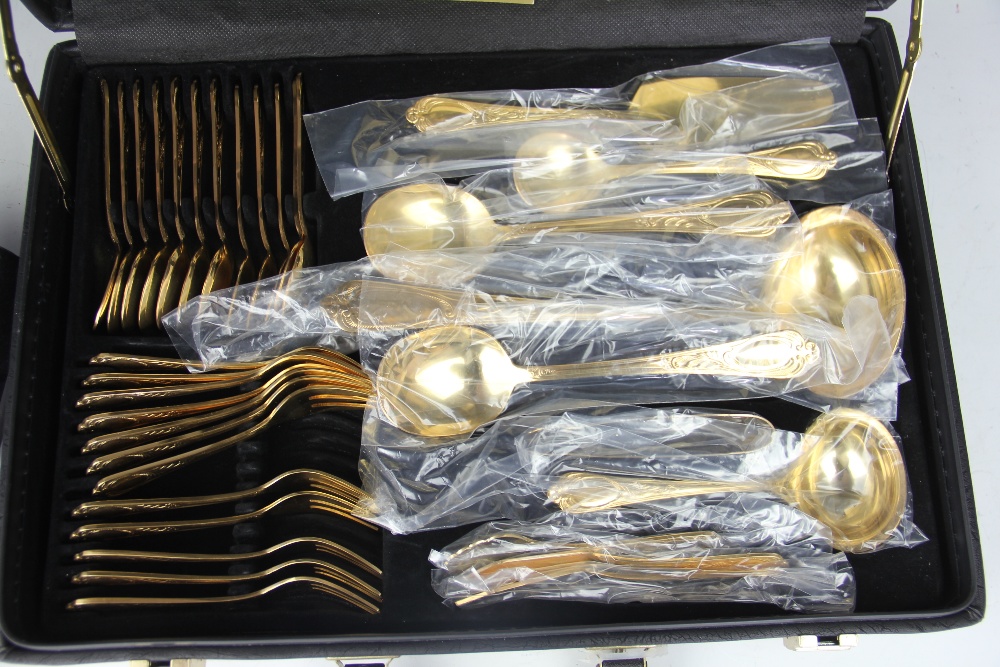 A Bestecke Solingen gold plated canteen; comprising twelve dinner forks, twelve dinner knives, - Image 2 of 3