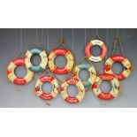A selection of nine vintage commemorative cruising life buoy floats, each hand painted,