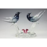 A Murano glass bird group, modelled with two blue and clear glass birds,
