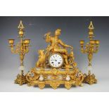 A French Louis XVI style gilt metal and alabaster clock garniture,