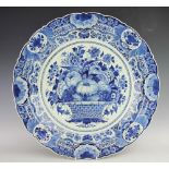 A large Delft blue and white dish, late 19th century,