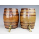 A near pair of late 19th century stoneware barrels, with brass taps, un-marked,