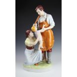 A large Royal Dux figural group of blacksmith, wife and child,