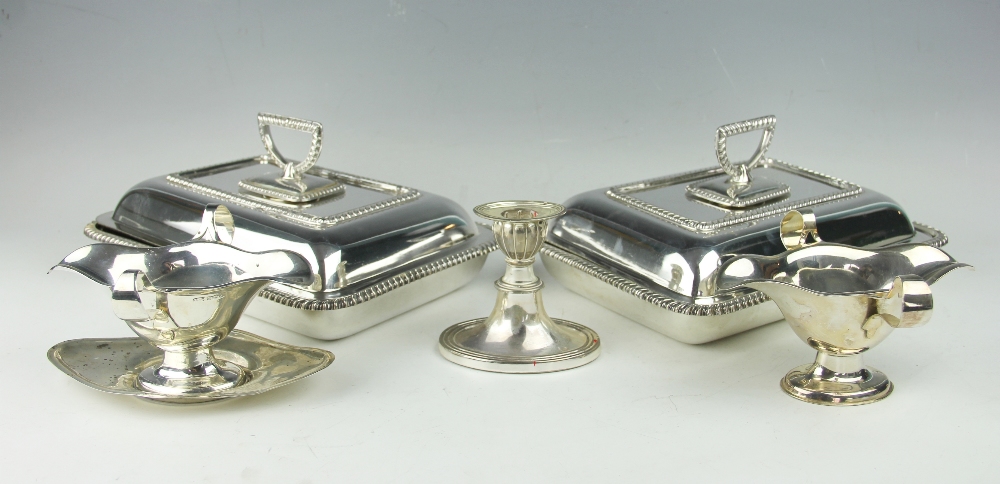 A selection of silver comprising; a twin handled sauce boat and stand, Levi & Salaman,