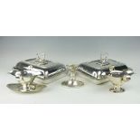 A selection of silver comprising; a twin handled sauce boat and stand, Levi & Salaman,