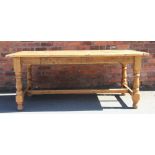 A Victorian style pine country farmhouse kitchen table, with cleated ends and turned legs,
