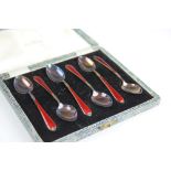 A set of six Walker & Hall silver and enamelled teaspoons, Birmingham 1957,