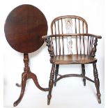A 19th century ash and elm Windsor chair, with hoop back and solid seat,