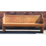 A Victorian pitch pine pew,
