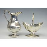 A Victorian silver jug, London 1855, of octagonal form with engraved detailing, 15cm,