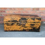 A Chinese camphor wood and black painted rectangular chest, with two wrought swing handles,