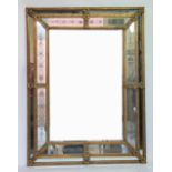 A modern Venetian style gilt wood and composition rectangular wall mirror,