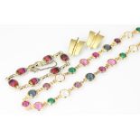 A decorative multi-coloured stone set necklace, each spectacle set,