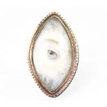 A late Georgian eye miniature, within navette shaped yellow metal surround,