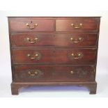 An early 19th century mahogany chest, of two short and three long drawers, on bracket feet,