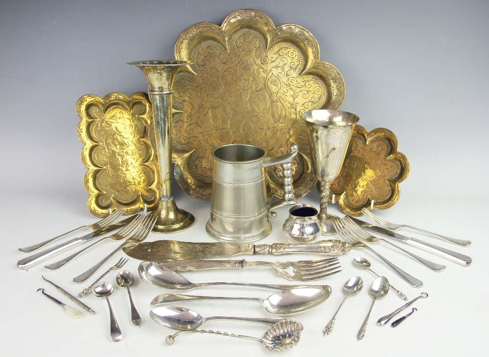 A small assortment of silver plated flatware,