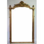 A late 18th century style carved gilt wood, gesso and composition mirror,