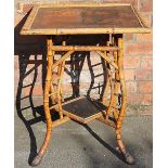 A late 19th century aesthetic bamboo table,
