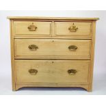An Edwardian pine chest, of two short and two long drawers, on bracket feet,