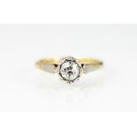 A diamond solitaire ring, the illusion set old cut diamond (of approx 0.