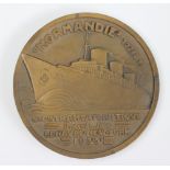 A 1935 'SS Normandie' bronze medallion, to commemorate the voyage from Le Havre to New York,