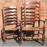 Three 19th century beech and ash ladder back country kitchen chairs, with rush seats,