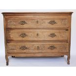 A late 18th century French provincial oak chest / commode,