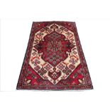 A Persian hand woven full pile wool rug,