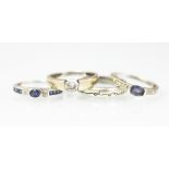 A sapphire and diamond ring set in 9ct white gold,