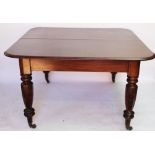 An early Victorian mahogany extending dining table, the top with a moulded edge,