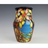 A limited edition Moorcroft vase, designed by Emma Bossons, No157/250 'C2002',